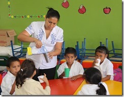 School milk in classroom, Honduras