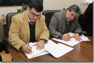Jorge Retamal y Javier Mora firmaron el convenio