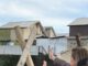 Grietas y daños estructurales en viviendas de Villa Rayenmapu debido a movimientos de tierra