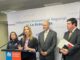 Autoridades gubernamentales anunciando el proyecto Cautelares Reforzadas para proteger a mujeres víctimas de violencia