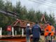 Autoridades locales junto al puente Faja 0 recién reparado en la comuna de Cunco tras sistema frontal.
