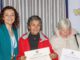 Autoridades y representantes de organizaciones de adultos mayores celebran la entrega de fondos en Villarrica