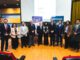 Autoridades y expositores participando en el seminario de educación tributaria de DEDECON y PUCV