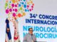 Dr Norman Lopez Velasquez presentando en el congreso internacional de neurologia en Punta Cana